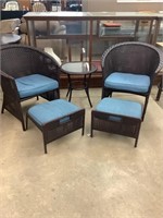 Small patio set. Two chairs with ottomans and a