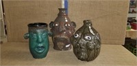 3 POTTERY FACE JUGS