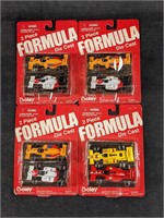 Four 2 Boley Piece Formula Diecast Cars