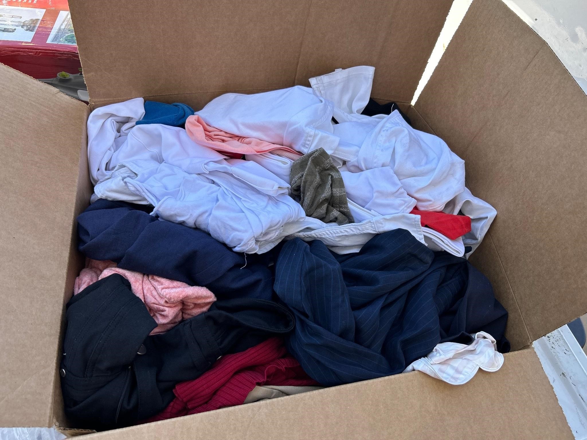 Miscellaneous box of new and used clothes