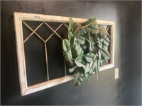 Wooden wall art with greenery