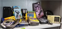 Assorted Walkmen, Transitor Radios, and Headphones