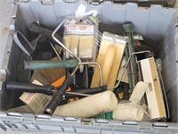 Bin of miscellaneous painting supplies