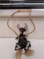 Decorative swinging moose