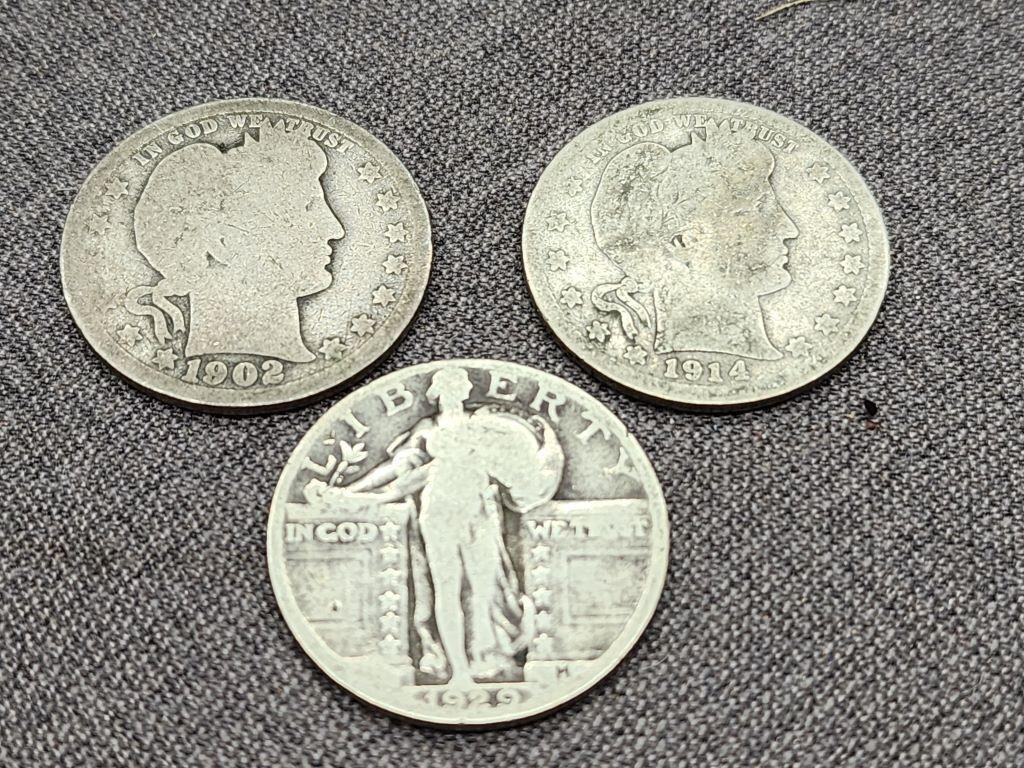 3 silver quarters.  2 Barber quarters and 1