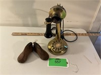 brass phone and baby wooden shoe forms