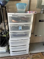 Two plastic three drawer organizers with kitchen s