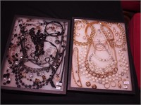 Two containers of costume jewelry: Lia Sophia,
