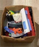 Vintage plastic train pieces includes track,