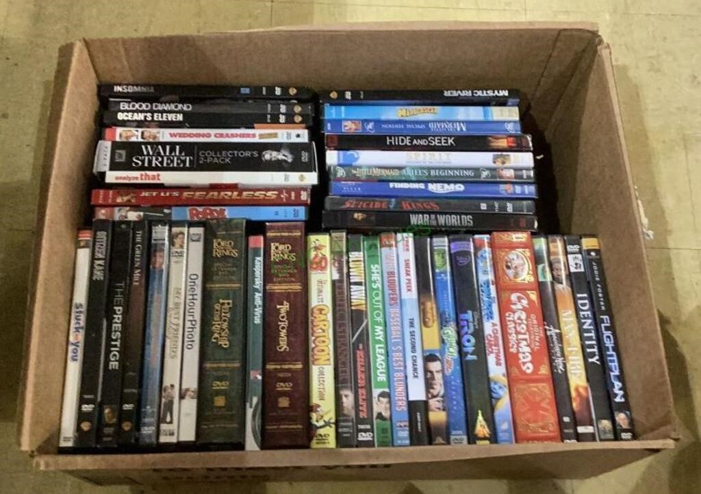 Box of 42 DVDs includes titles such as Baseball
