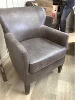Gray rustic studded arm chair.  Matches lot 6a