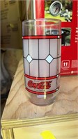 A single Coca Cola glass