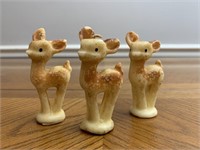 Three reindeer candles