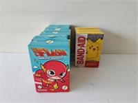 9 packages of band aids the Flash and Pokemon