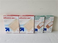4 packages of up and up bandages