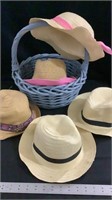 Various hats in a blue basket