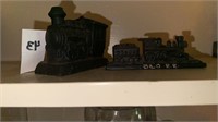 Two metal train paper weights