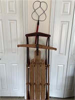 Antique sled and rug beater