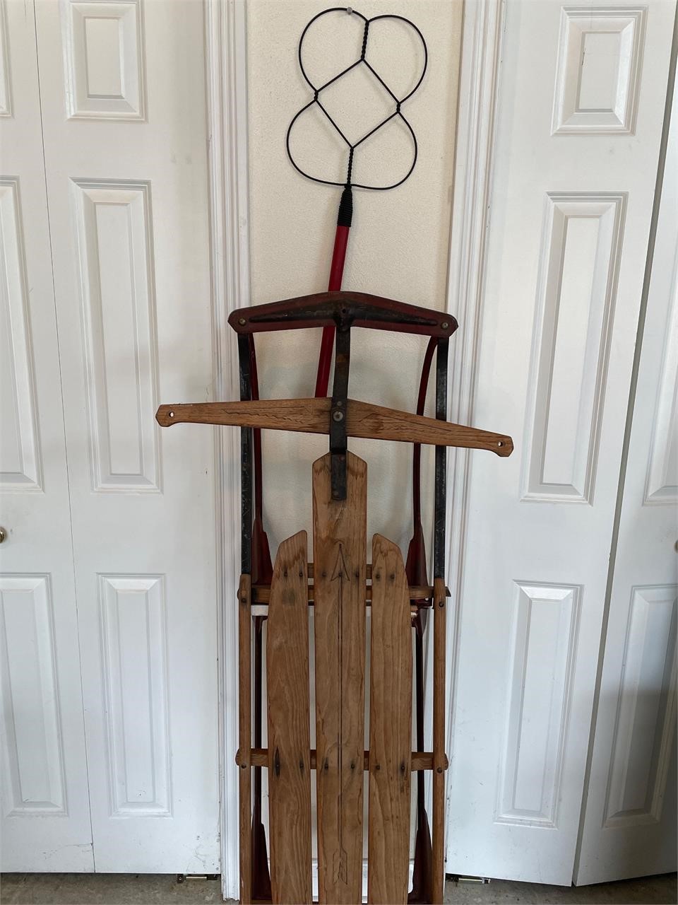 Antique sled and rug beater