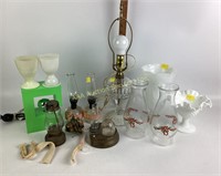 Oil lamps, gloves, milk glass vase, uranium v