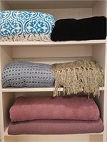 Throw Blankets & Afghans, as pictured in cabinet