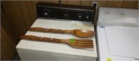 Large 28 inch tall carved wooden spoon and fork.