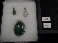 Three sterling pendants, one is large malachite