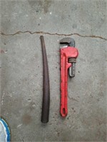 Punch and pipe wrench