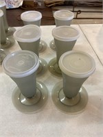 six Tupperware dessert cups with lids