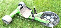 vintage green machine toy- see damage near pedals