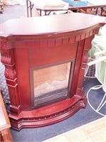 Freestanding electric fireplace that can be flush