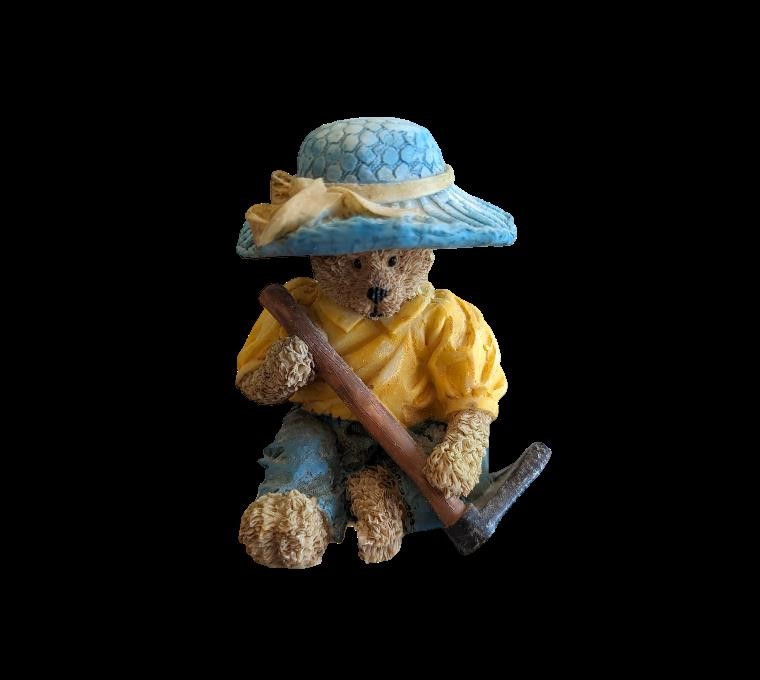 Teddy Bear wearing blue hat & Garden Hoe