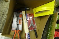 Assorted hand tools; hammer, pliers and trowel