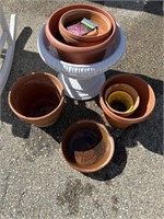 Terra cotta and plastic planters