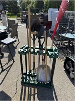 Long handle yard tools and plastic storage rack