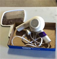 Hair dryer with mirror