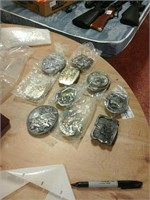 Bag of different belt buckles