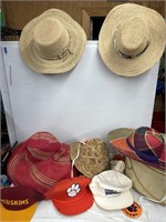 Lot of hats - sun hats, Clemson, redskins in a