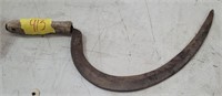 Antique sickle, wood handle