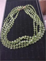 Long green necklace