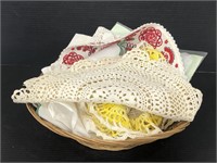 Basket of vintage doilies