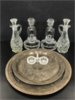 Vintage glass candlesticks, bottles and trays
