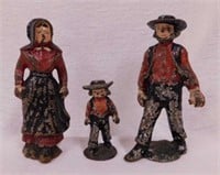3 vintage cast iron Amish family figurines,