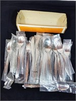 Set of new stainless steel flatware