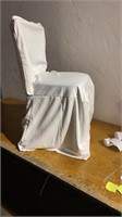 Three ivory chair covers
