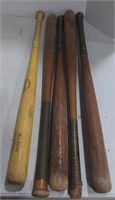 (AB) 5 baseball bats *times the quantity