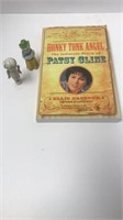Patsy Cline paperback 
Two vintage figurines