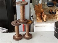 3 large wooden spools