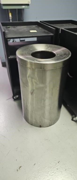 Stainless steel garbage can located upstairs