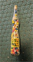 Stretched A&W Bottle full of Gumballs